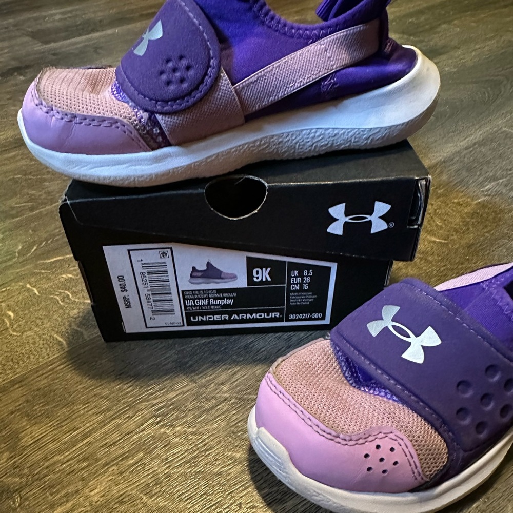 Kids purple Under Armour sneaker.